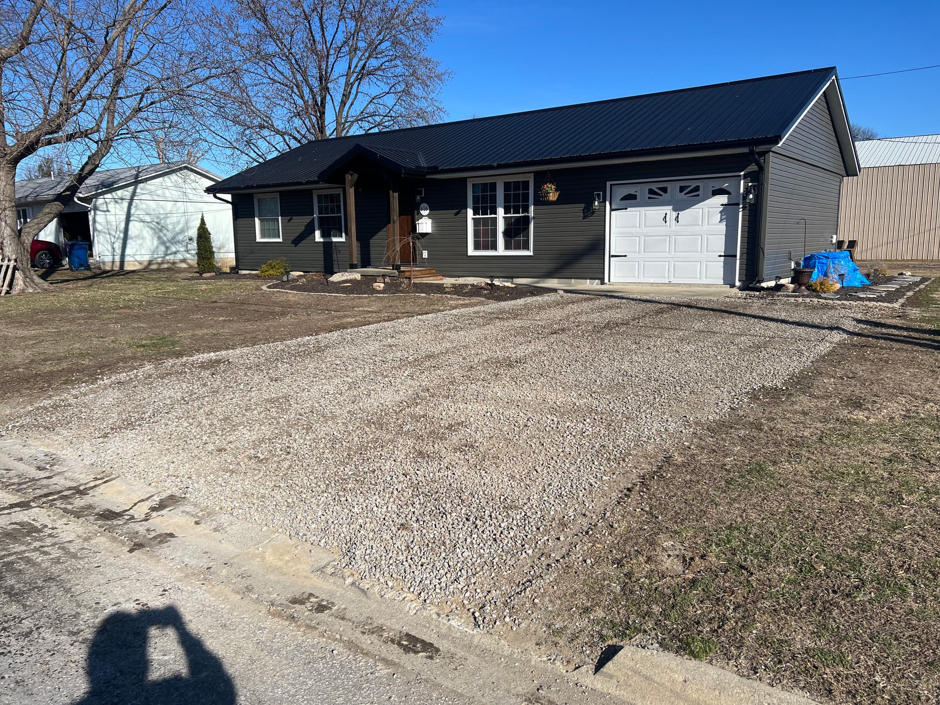 Freshened Up Gravel Driveway for a Stunning First Impression