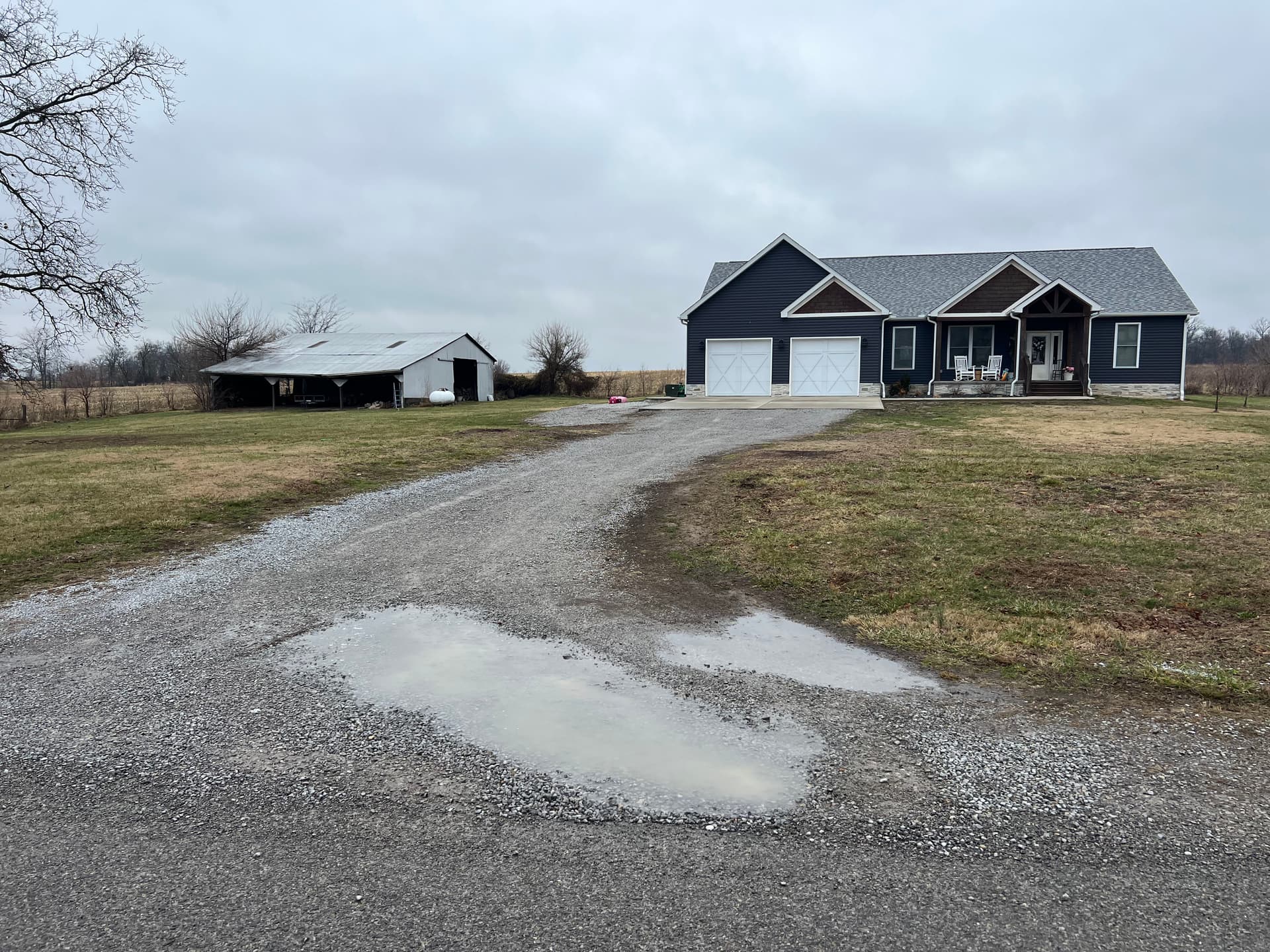 Driveway Makeover Enhances Entryway and Solves Drainage Issues