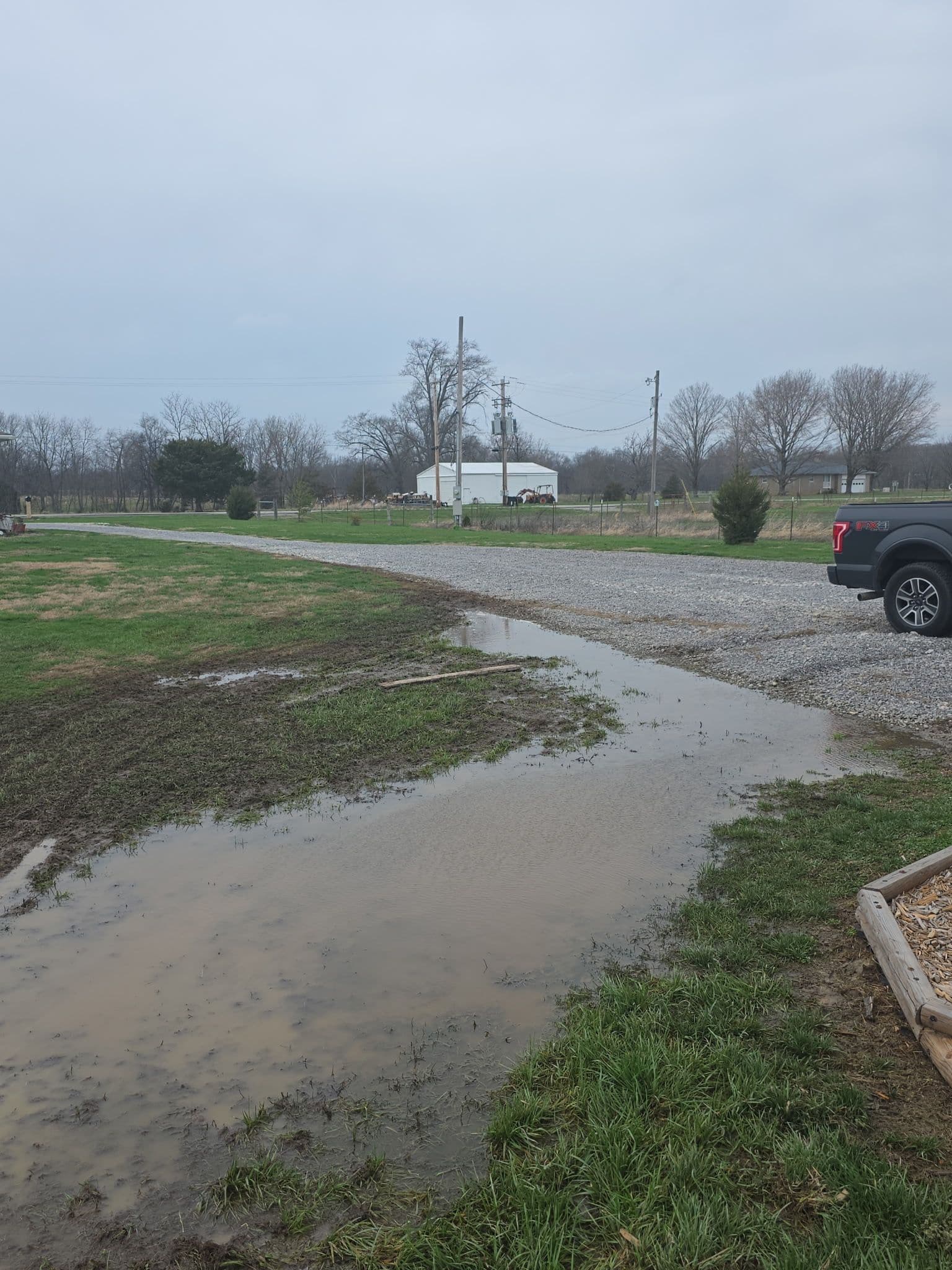 Catch Basin Drainage Fix Routes Standing Water to Pond in Jefferson County IL image