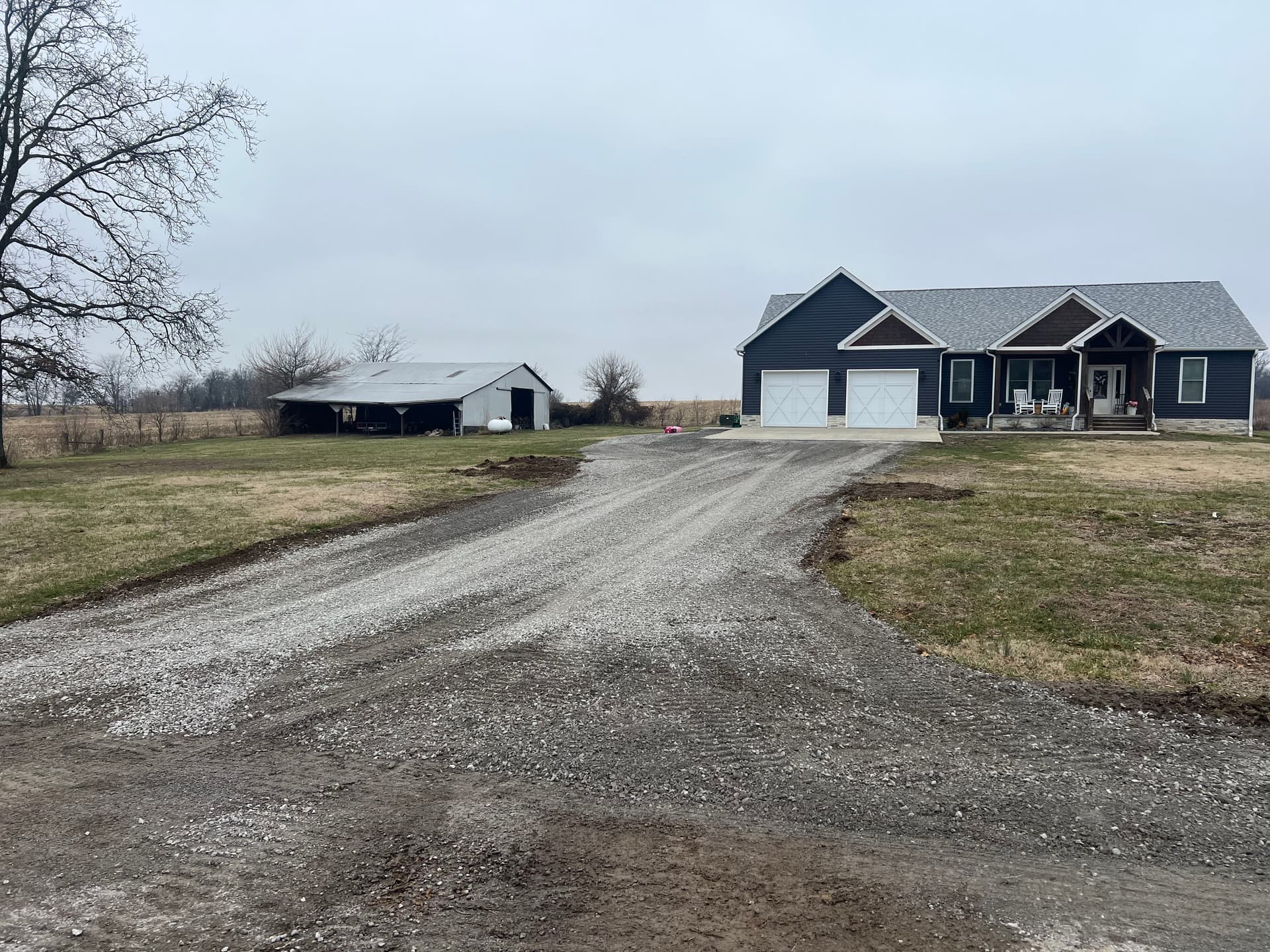 Gallery photos for Driveway Makeover Enhances Entryway and Solves Drainage Issues: Image #1
